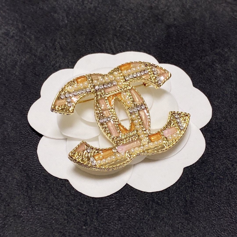 Ch**el brooches